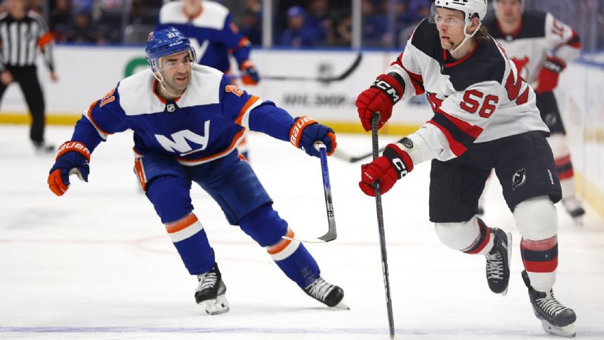 Hughes, Meier, Kahkonen power Devils to 4-0 victory over the Islanders