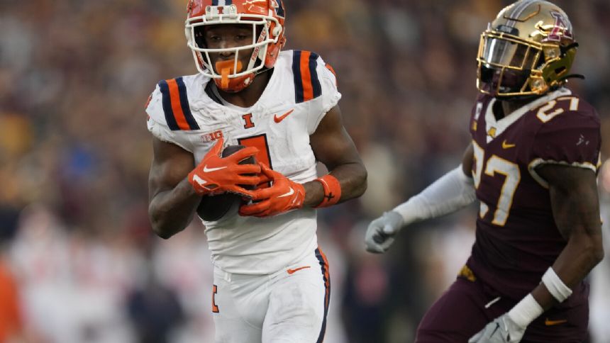 Illinois stuns Minnesota 27-26 on TD pass by Paddock in final minute after late QB switch for injury