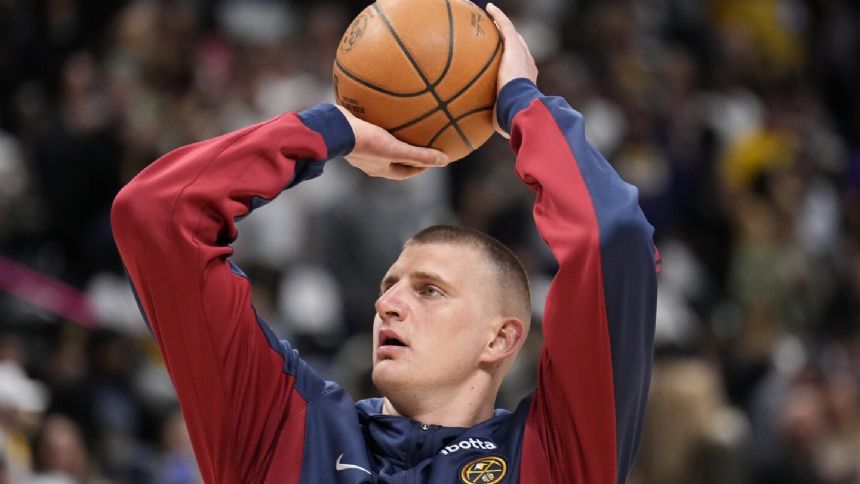 In character: Nuggets big man Nikola Jokic shows up to game dressed ...