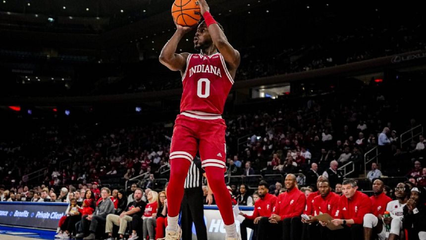 Indiana closes on a 13-2 run to beat Louisville 74-66 for 3rd place at the Empire Classic