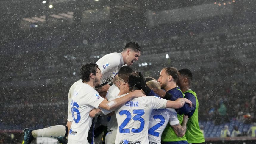 Inter wins 4-2 at Roma to end De Rossi's perfect record and go 7 points clear in Serie A