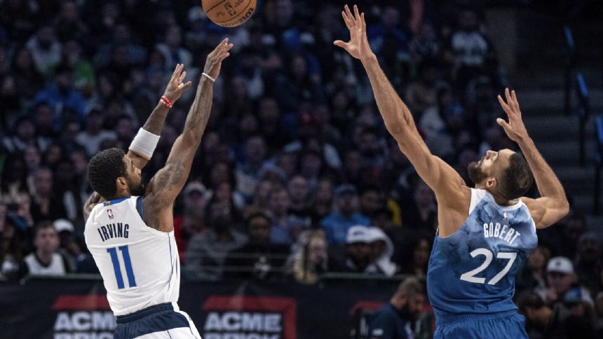 Irving hits big 3-pointers, scores 35 points to lead the Mavericks over the Timberwolves, 115-108