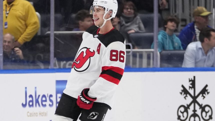Jack Hughes has 2 goals and 2 assists, including OT winner, as Devils top Islanders 5-4