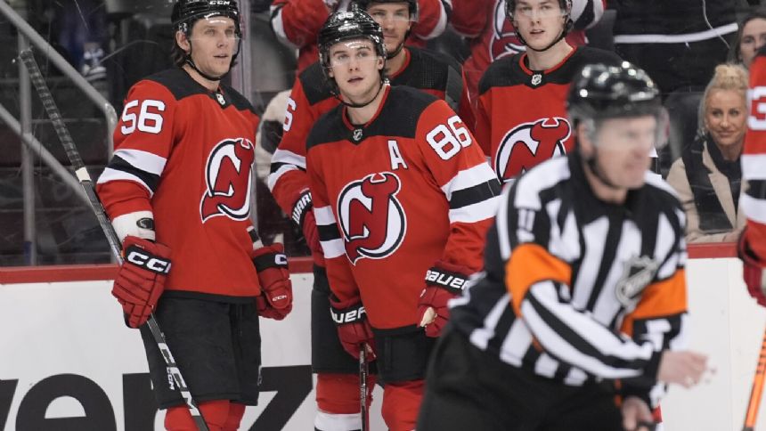 Jack Hughes has a goal and an assist, Nico Daws makes 27 saves to lead the Devils over Seattle 3-1