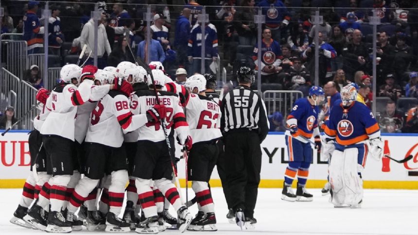 Jack Hughes scores second goal of game in OT as Devils beat Islanders 5-4