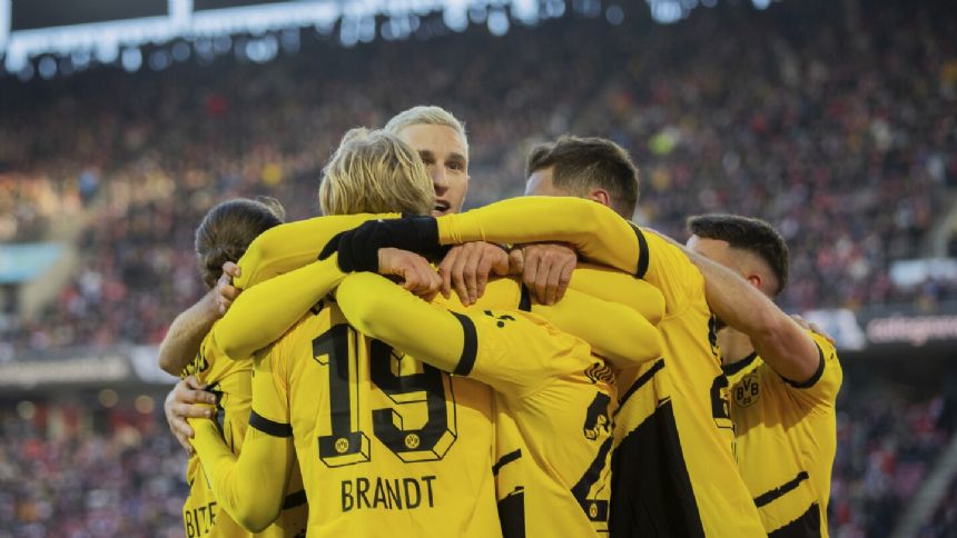 Jadon Sancho wins a penalty as Dortmund beats Cologne 4-0 in the Bundesliga