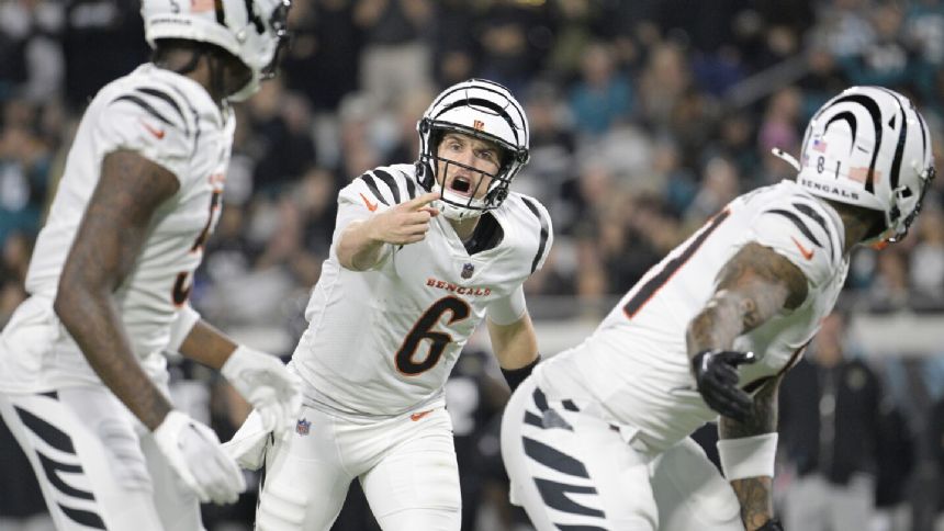 Jake Browning steals spotlight as Bengals stun Jaguars 34-31 in OT. Trevor Lawrence injures ankle