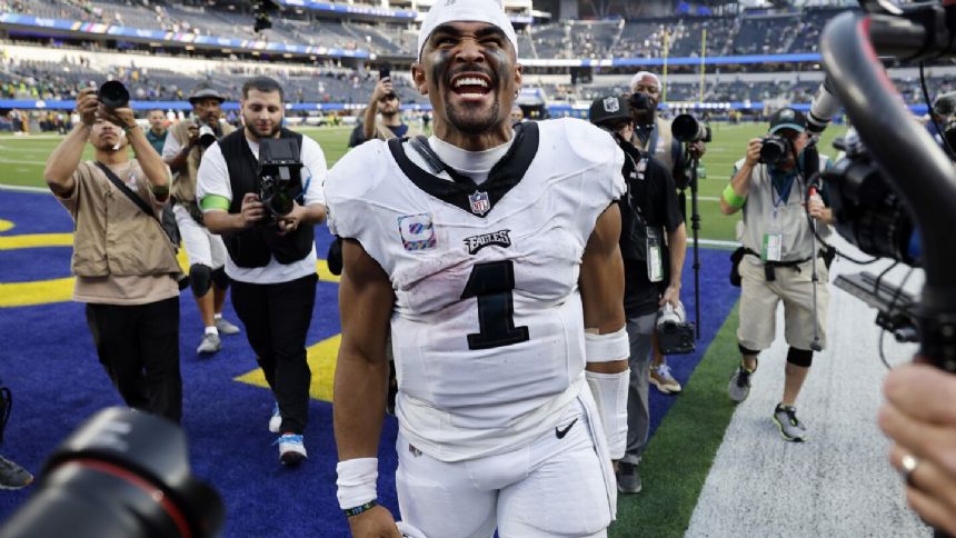 Jalen Hurts and a tough defense carry the Eagles to a 23-14 victory over the Rams