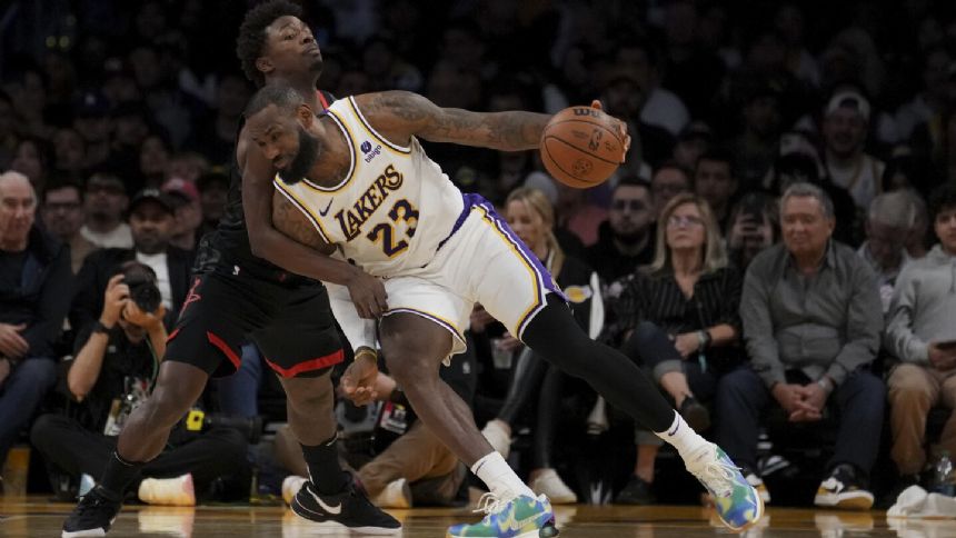 James scores season-high 37, hits go-ahead free throw as Lakers hold off Rockets 105-104