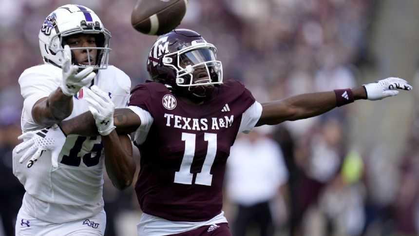 Jaylen Henderson leads Texas A&M to victory in Elijah Robinson's first game as interim coach.