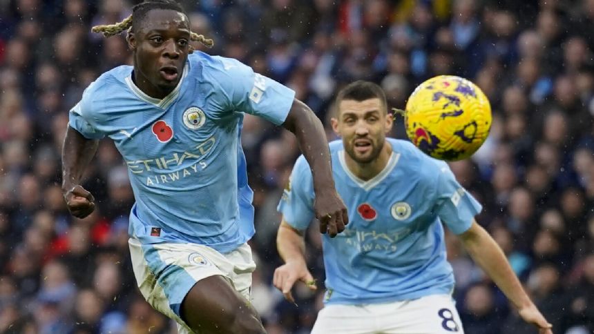 Jeremy Doku scores one goal and has four assists as Manchester City routs Bournemouth 6-1