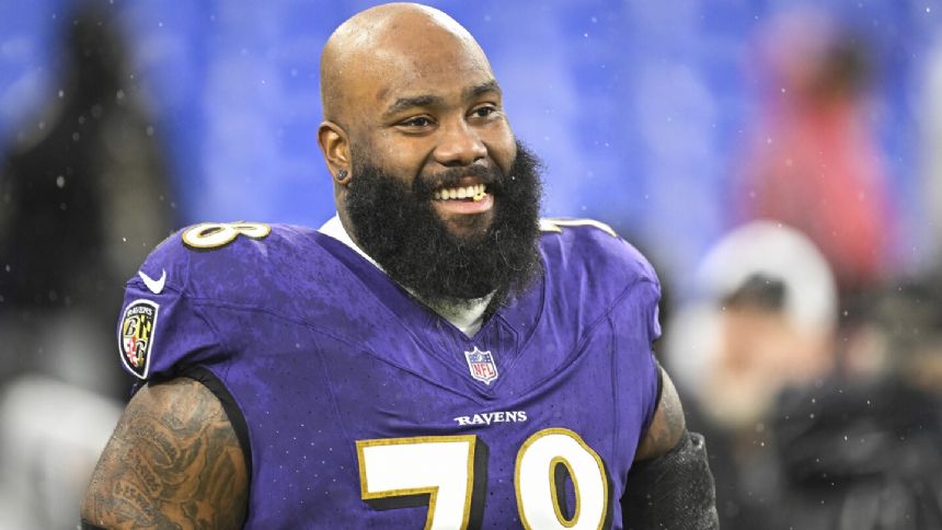 Jets acquiring offensive tackle Morgan Moses from Ravens in deal that includes picks, AP source says