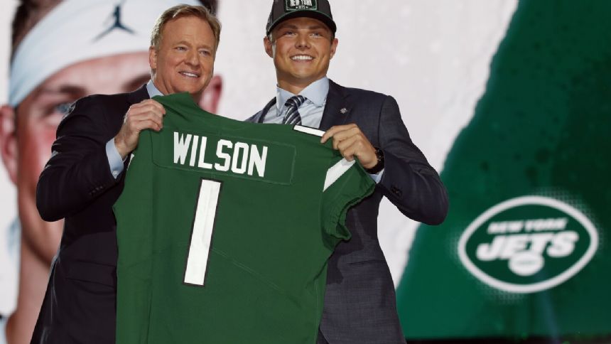 Jets trade quarterback Zach Wilson to the Broncos, AP source says