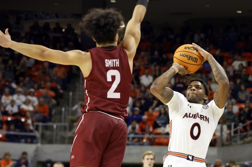 Johnson sharp on 3s, unbeaten No. 15 Auburn beats Colgate