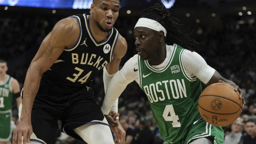 Jrue Holiday agrees to 4-year, $135 million extension with Celtics