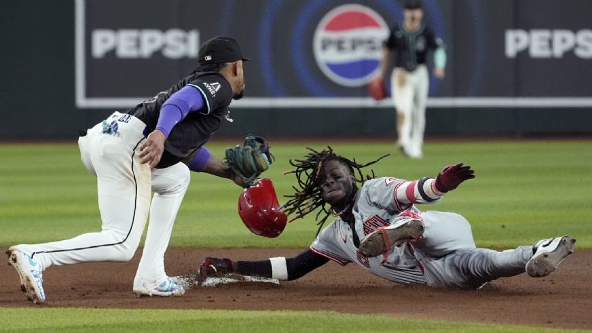 Kevin Newman's two-run single in the ninth gives the Diamondbacks a 6-5 victory over the Reds
