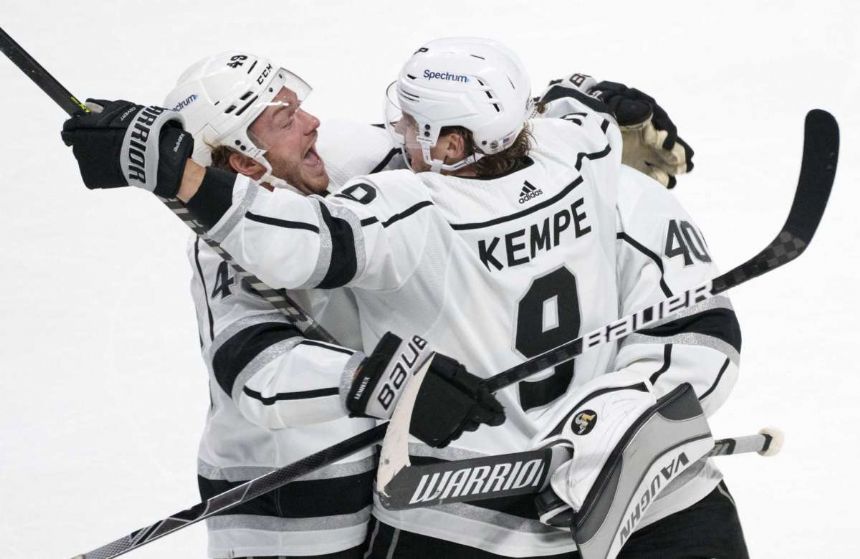 Kings extend winning streak to 6 with OT win over Montreal