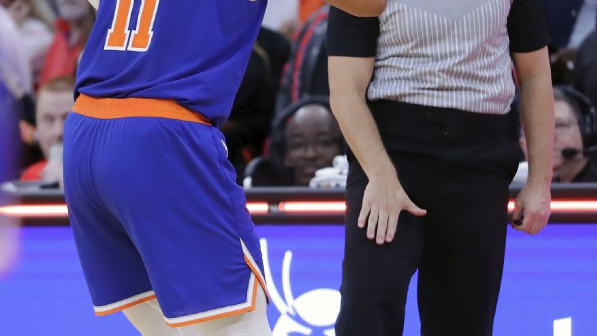 Knicks protesting loss in Houston that ended on foul call refs said was incorrect, AP source says