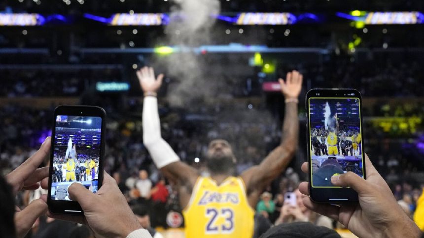 Lakers hold off Clippers 130-125 in OT to snap an 11-game losing streak in the Los Angeles rivalry