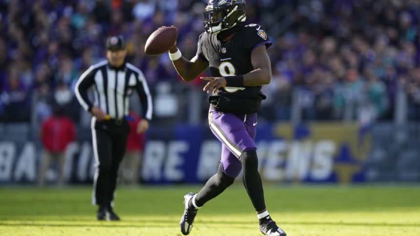 Lamar Jackson's perfect day clinches top seed in AFC for Ravens, fuels rout of Dolphins