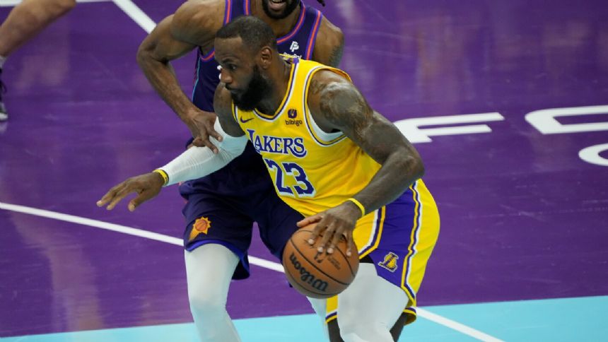 LeBron James pokes fun at Michigan and coach Jim Harbaugh for sign-stealing scandal