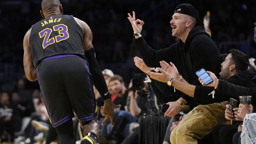 LeBron James' big 4th quarter propels Lakers past Suns 106-103 and into tourney semifinals