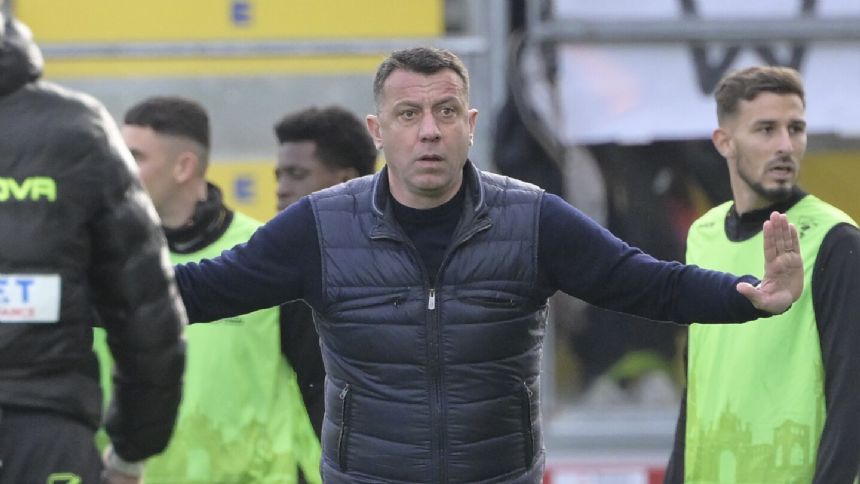 Lecce coach Roberto D'Aversa head butts Verona striker Thomas Henry following heated Serie A game