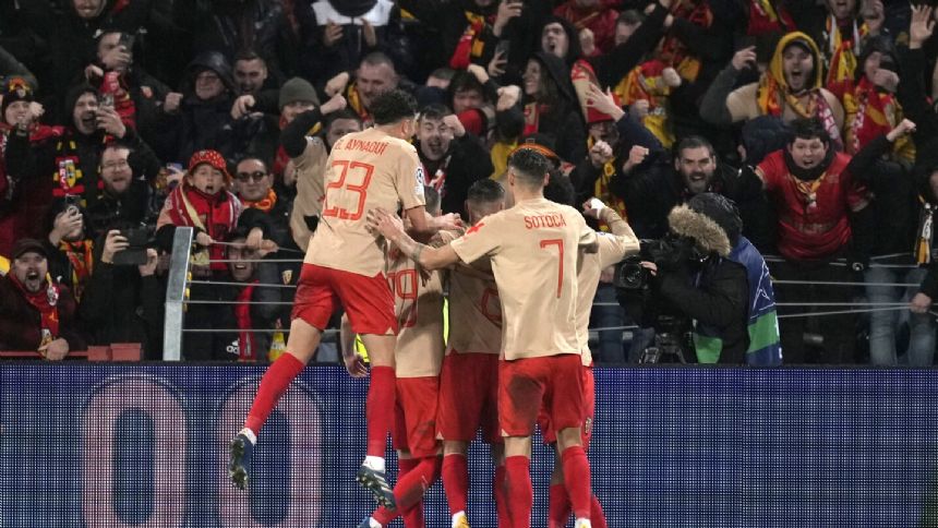Lens beats Sevilla 2-1 in last Champions League group game. French club earns Europa League spot