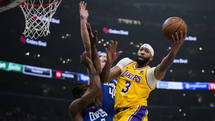 Leonard's triple-double leads Clippers over LeBron-less Lakers 127-116