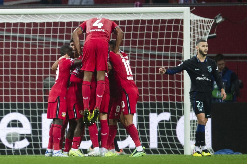 Leverkusen scores late to beat Atletico Madrid 2-0 in CL