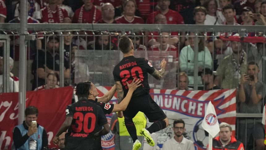 Leverkusen strikes late to hold Bayern 2-2 in Munich to declare itself a Bundesliga title contender