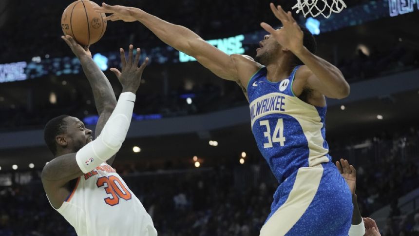 Lillard delivers down the stretch to help the Bucks outlast the Knicks 110-105