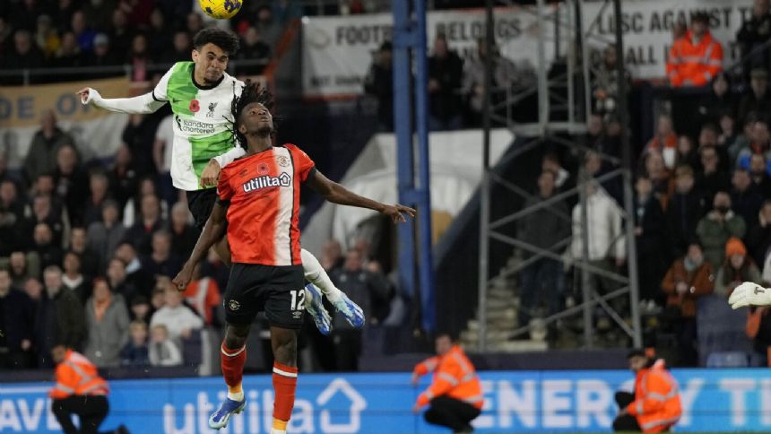 Liverpool strikes late through returning Luis Diaz to snatch a 1-1 draw at Luton in Premier League
