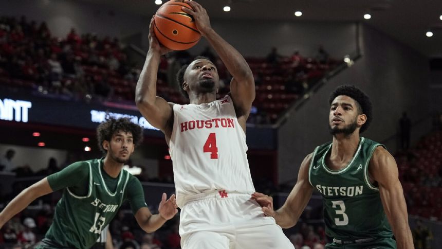 L.J. Cryer scores 21 to lift No. 6 Houston over Stetson 79-48