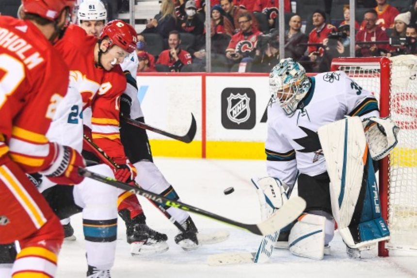 Logan Couture, Adin Hill lead Sharks to 4-1 win over Flames