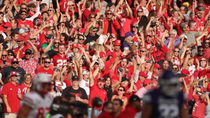 LOOK: Nebraska-Northwestern fans in Ireland get treated to free beer after internet outage