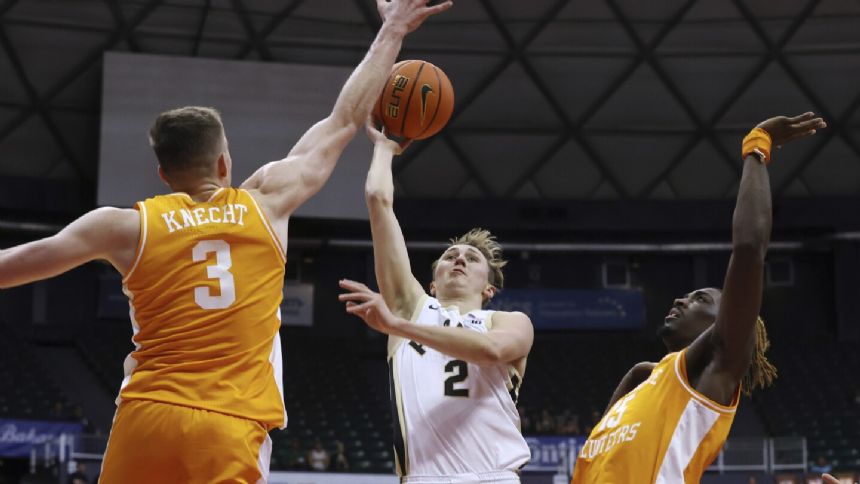 Loyer scores 27, Purdue pulls away late to beat Tennessee 71-67 in Maui Invitational