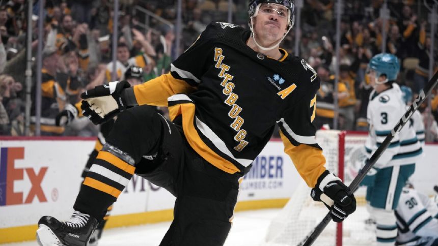 Ludvig, Rakell help Penguins pull away from Sharks, 6-3