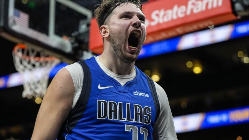 Luka Doncic scores Mavericks-record 73 points in 148-143 win over Hawks