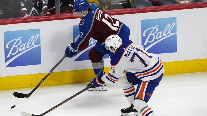 MacKinnon has 2 assists, breaks franchise's single-season points mark as Avs beat Oilers 5-1