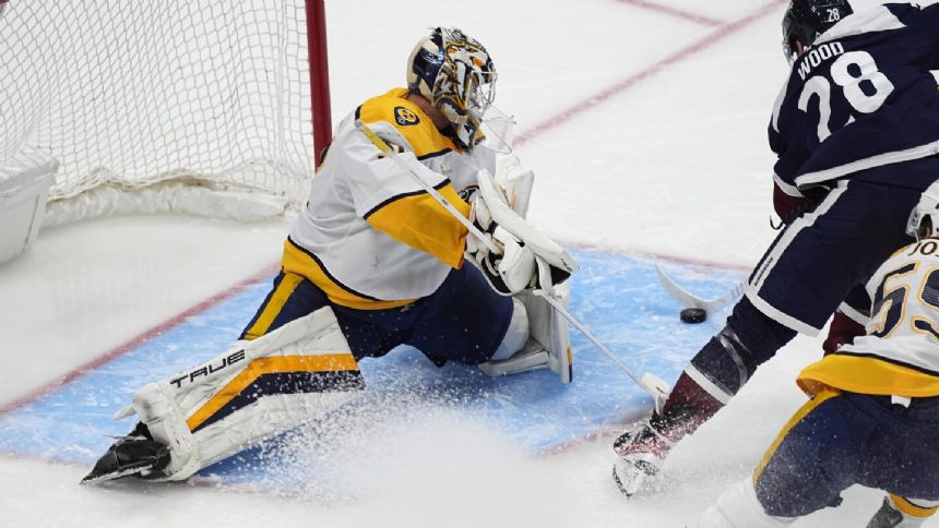 MacKinnon, Trenin help Avalanche rally past Predators 7-4 to clinch playoff berth