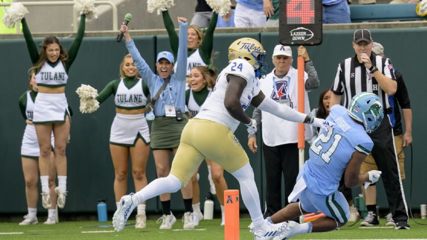 Makhi Hughes' 131 yards and touchdown help No. 20 Tulane hold on against Tulsa, 24-22