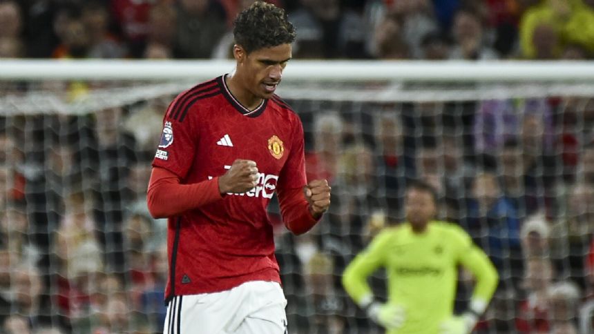 Man United needs late goal by Raphael Varane to beat dominant Wolves 1-0 in Premier League opener