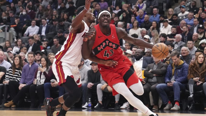 Martin has season-high 24 points and career-high 12 rebounds as Heat beat Raptors 112-103