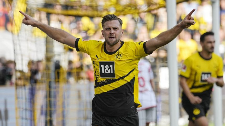 MATCHDAY: Unbeaten Dortmund hosts Bremen, improving Lens travels to Le Havre
