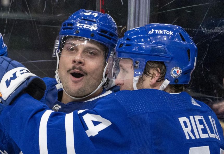 Matthews scores in OT to lift Maple Leafs past Flames 2-1