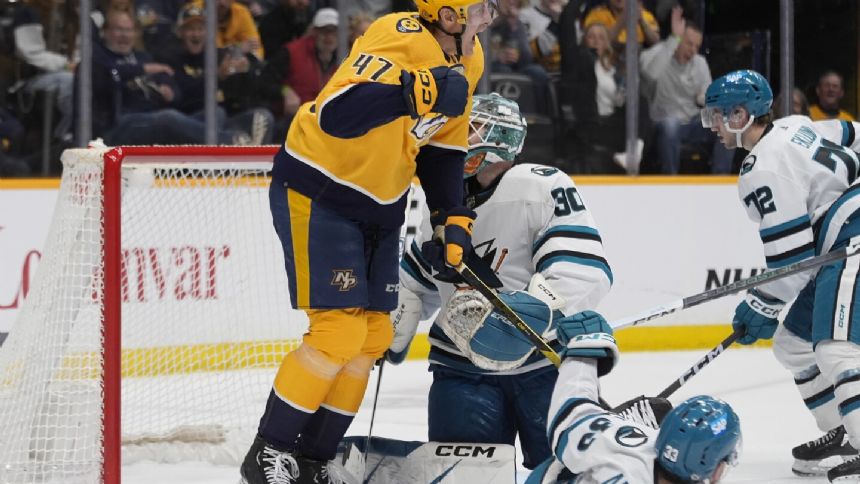 McCarron scores 2 goals to lead Predators over Sharks 8-2, team extends point streak to 15 games