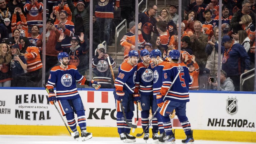 McDavid, Kane help Oilers beat Avalanche 6-2 to clinch playoff berth