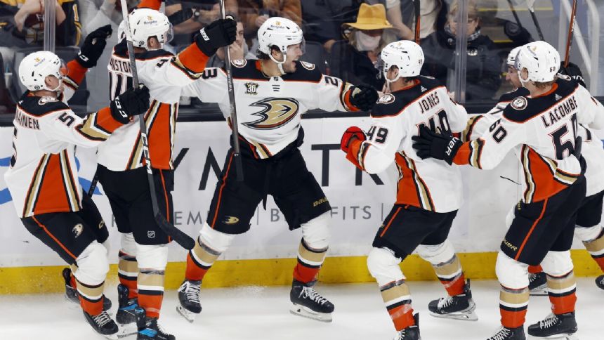 McTavish scores in OT as Ducks hand Bruins their first loss of the season with a 4-3 victory