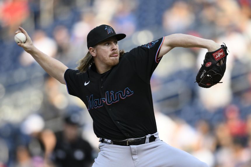 Mets get 2 pitchers from Marlins in trade for minor leaguer